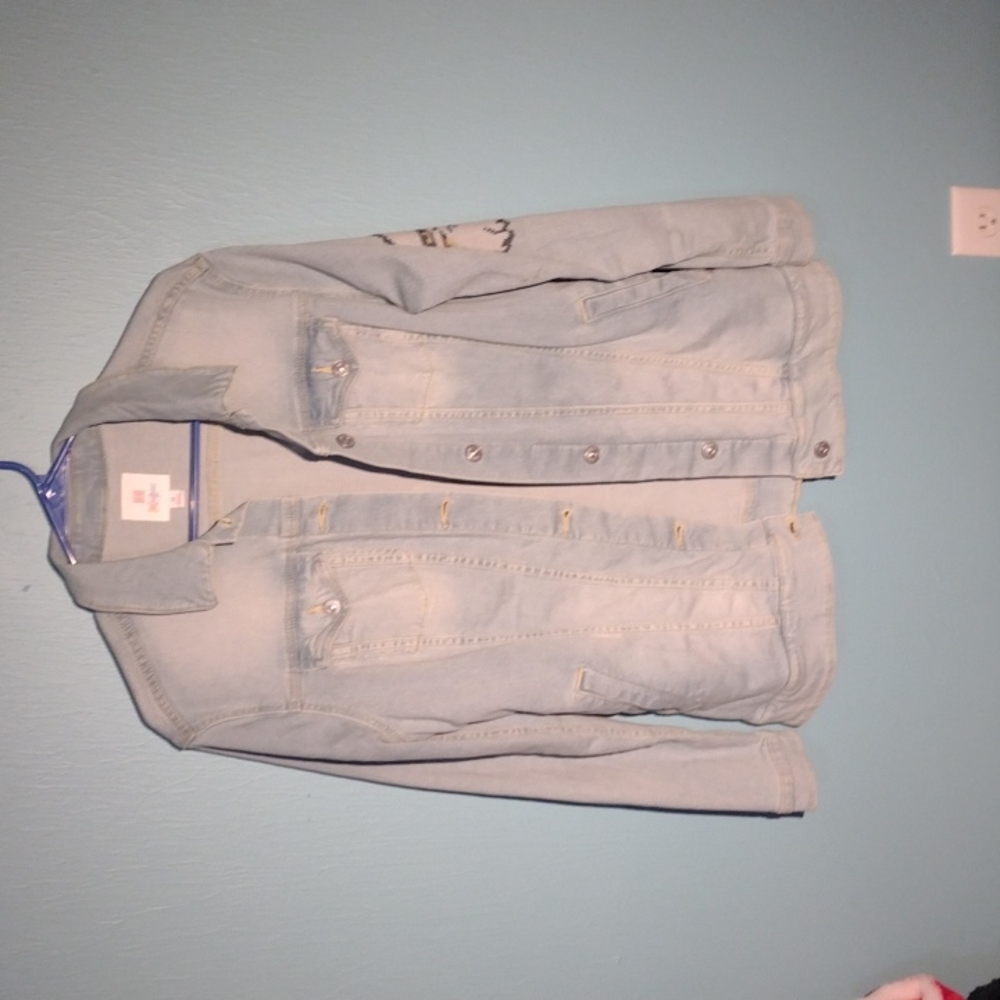 Light washed denim jacket with embroidered eagle sleeve